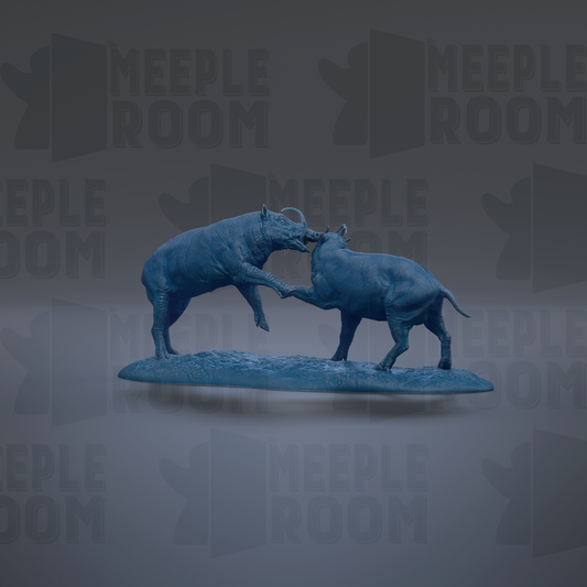 two blue animal sculptures engaged in a playful interaction, standing on a gray surface.
