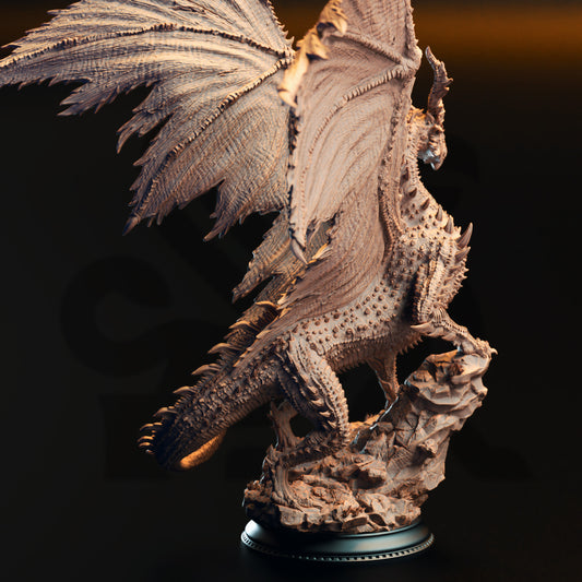 A detailed 3D model of a dragon statue with intricate scales and wings, standing on a rock formation.