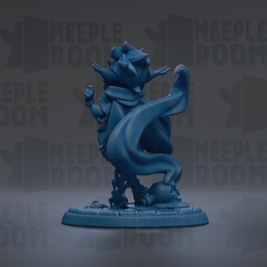 A blue figurine of a fantastical creature with a flowing cape and wings, standing on a base.