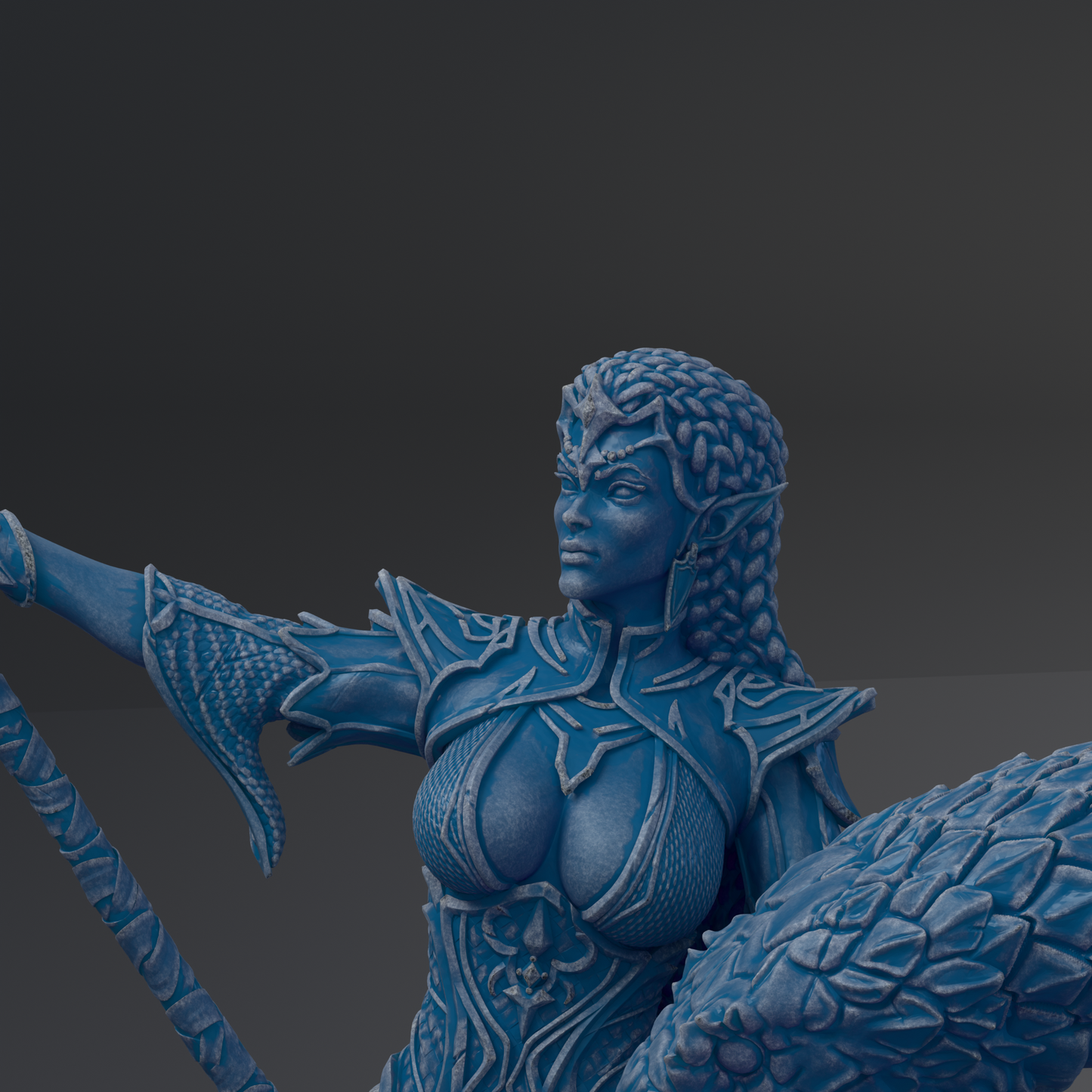A blue, detailed statue of a female warrior figure with intricate armor and a fierce expression.