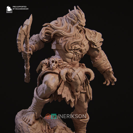 a statue of a demon holding a sword