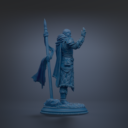 A blue statue of a warrior standing on a pedestal, holding a spear and a flag.