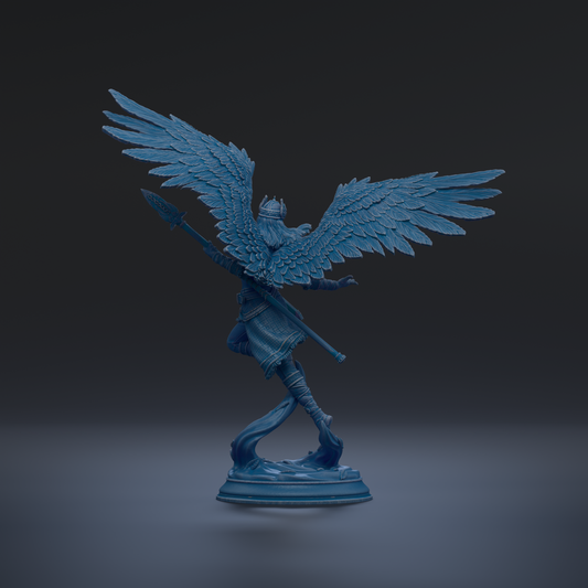 A blue statue of a winged figure with a sword and shield stands on a pedestal against a dark background.