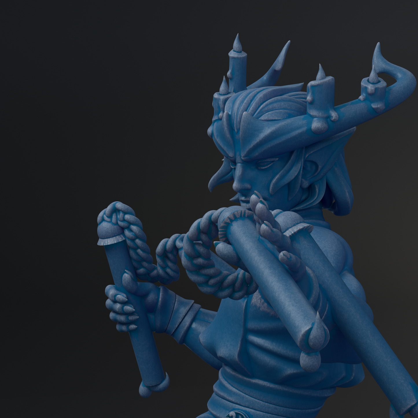 A blue, fantastical statue of a character with horns and a beard, holding a staff and wearing a crown.