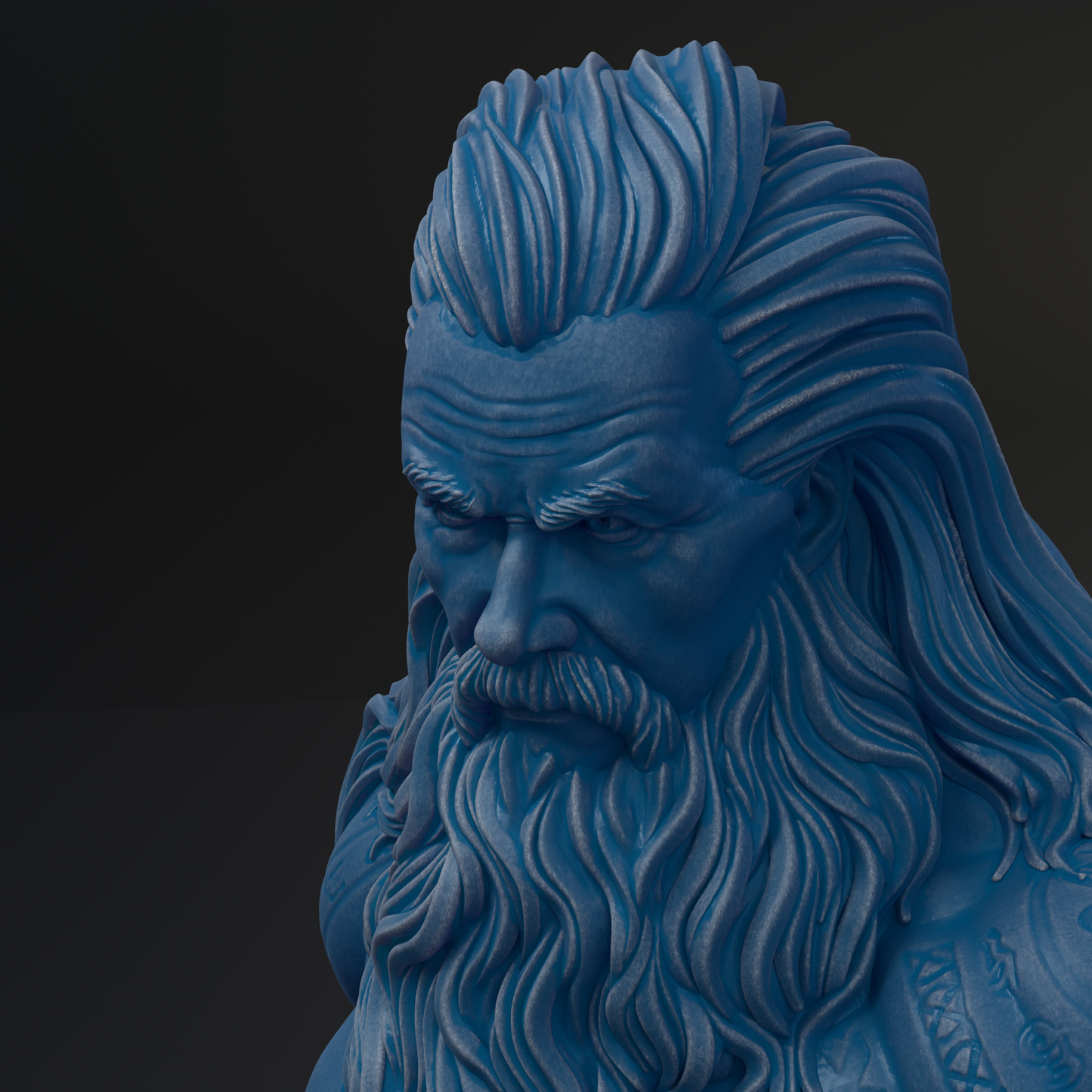 A close-up view of a blue, sculpted statue depicting a bearded man with a serious expression.