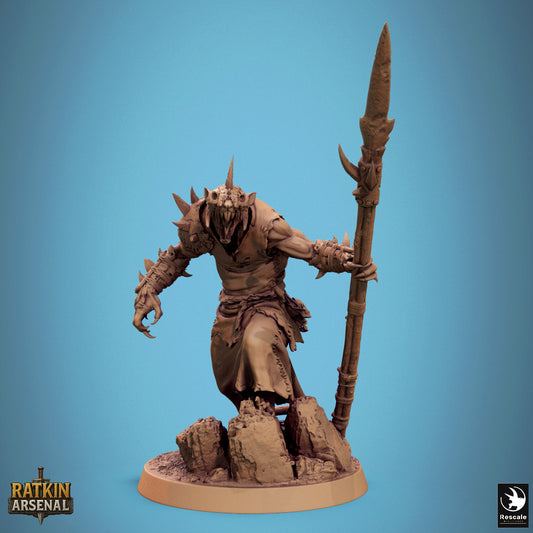 A 3D model of a fierce-looking monster or dragon-like creature, standing on a rocky base and holding a spear.