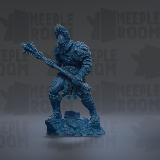 A blue statue of a warrior figure holding a weapon and standing on a rock.