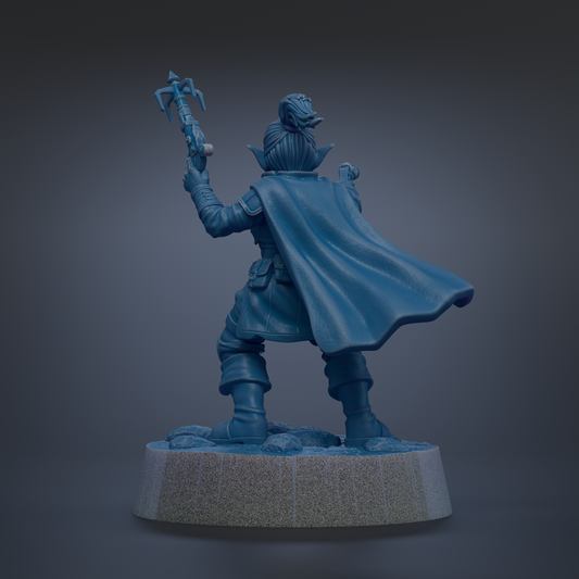 A blue statue of a person holding a weapon and wearing a cape, standing on a pedestal.