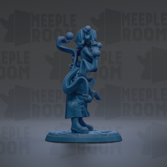 A blue figurine of a person with a large head and long hair, standing on a blue base.
