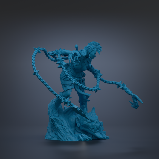 A 3D rendering of a blue-colored character with spikes and chains, standing on a rock formation.