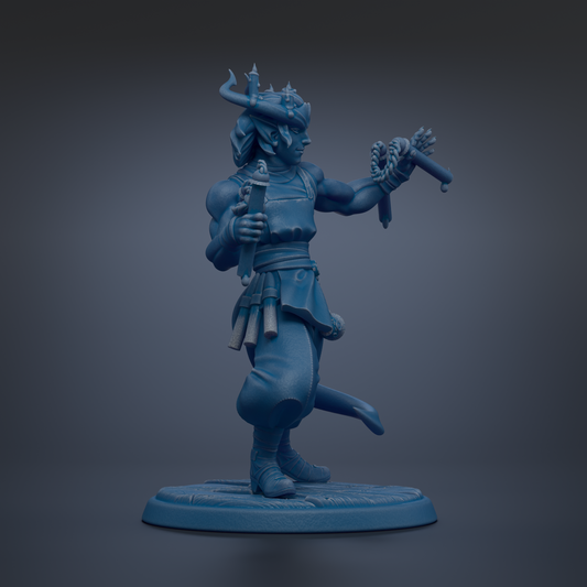 A blue figurine of a warrior standing on a base, holding a weapon and wearing a crown.