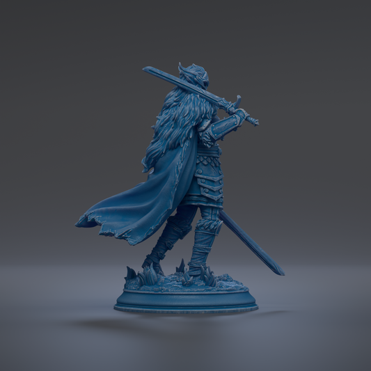 A blue statue of a warrior figure holding a sword and shield, standing on a base with a flowing cape.