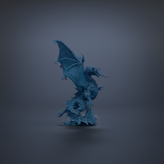 A blue dragon figurine with wings spread, standing on a dark surface against a dark background.