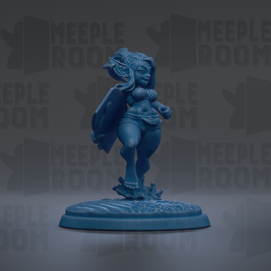 A blue figurine of a woman with a large head and long hair, standing on a base with a wave-like pattern.