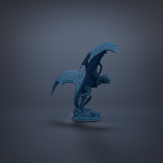 A blue dragon figurine is shown against a dark background.