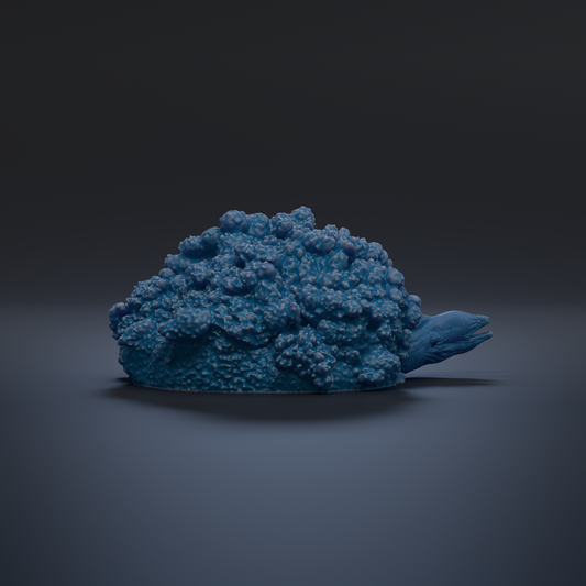 A blue, textured object resembling a small, organic shape resembling a sea creature or plant.