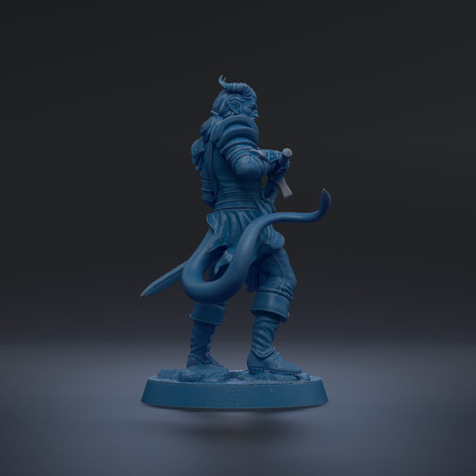 A blue figurine of a warrior standing in a fighting stance, holding a sword and shield, against a dark background.