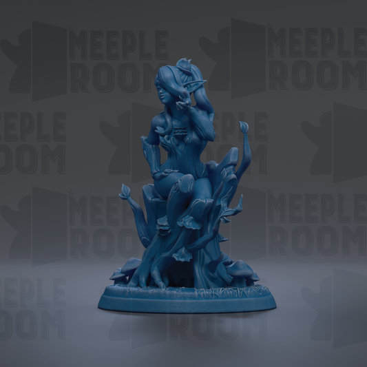 A blue figurine of a woman sitting on a tree stump, surrounded by various other figurines, against a dark background with repeated text.