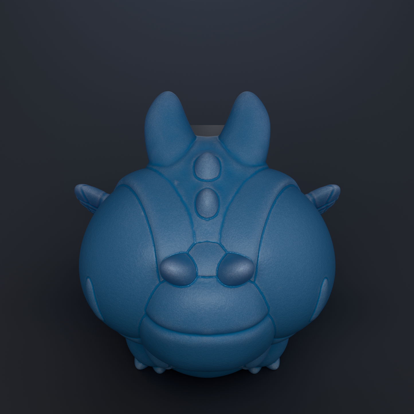 A blue, cartoon-like creature with a large head and small body is shown against a dark background.