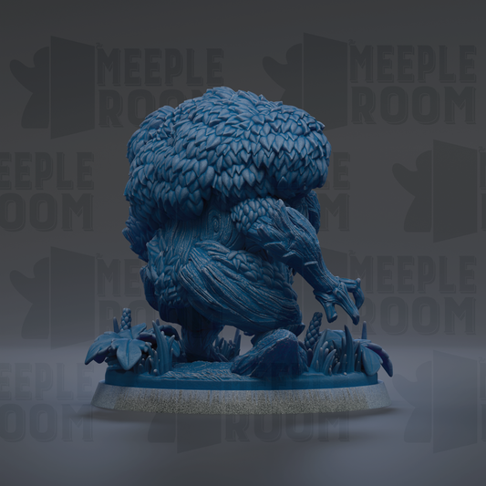 A blue, 3D-rendered creature resembling a dragon or mythical being, sitting on a base with leaves and plants.