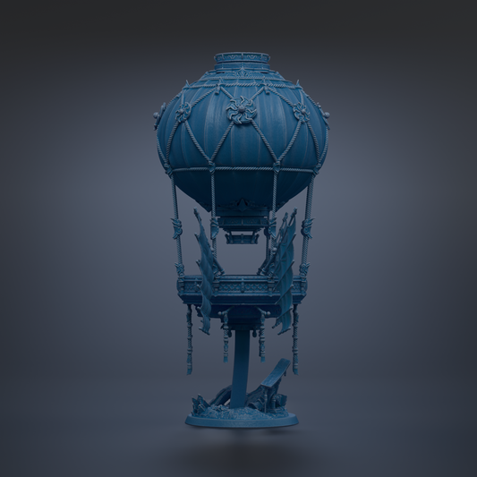 A blue, ornate hot air balloon sculpture stands against a dark background.