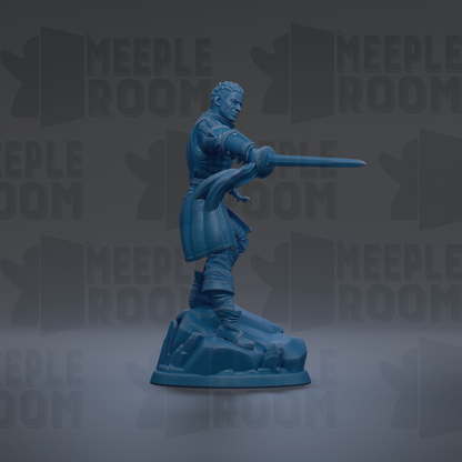 A blue figurine of a warrior standing on a rock, holding a sword in a fighting stance.