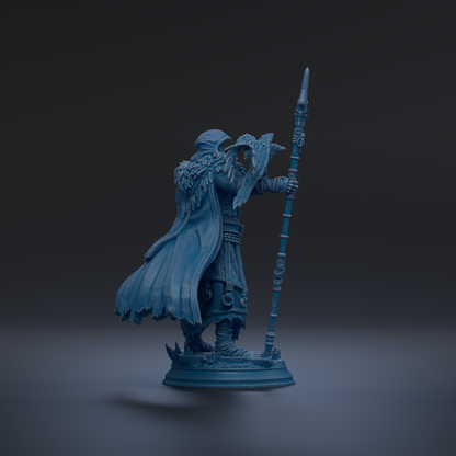 A blue statue of a warrior figure holding a spear and shield, standing on a pedestal against a dark background.