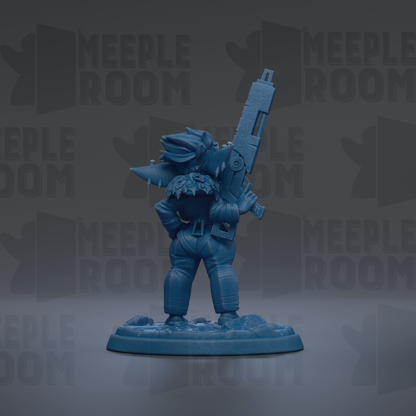 A blue figurine of a character holding a large gun, standing on a base.