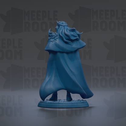A blue figurine of a person with flowing hair and a cape, standing on a base.