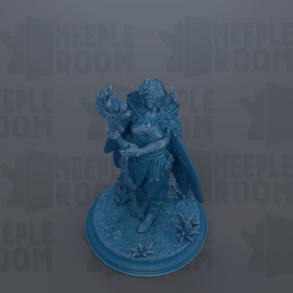 A figurine of a woman with a sword and a crown, standing on a blue base with flowers, against a gray background with repeated text.