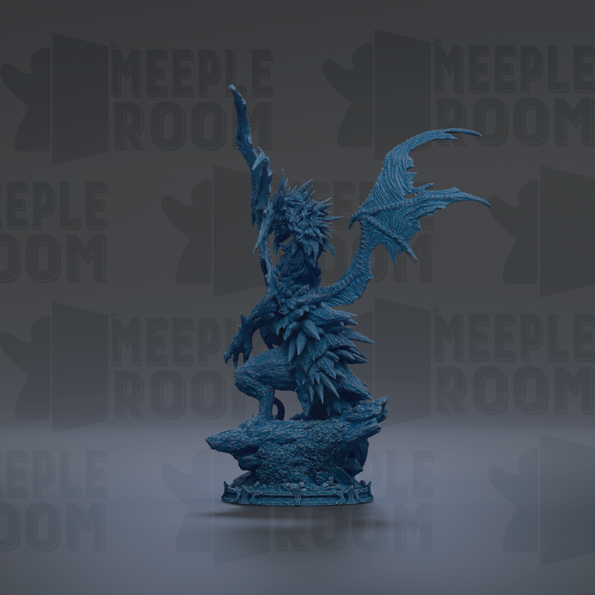 A blue dragon statue with wings spread, standing on a rock.
