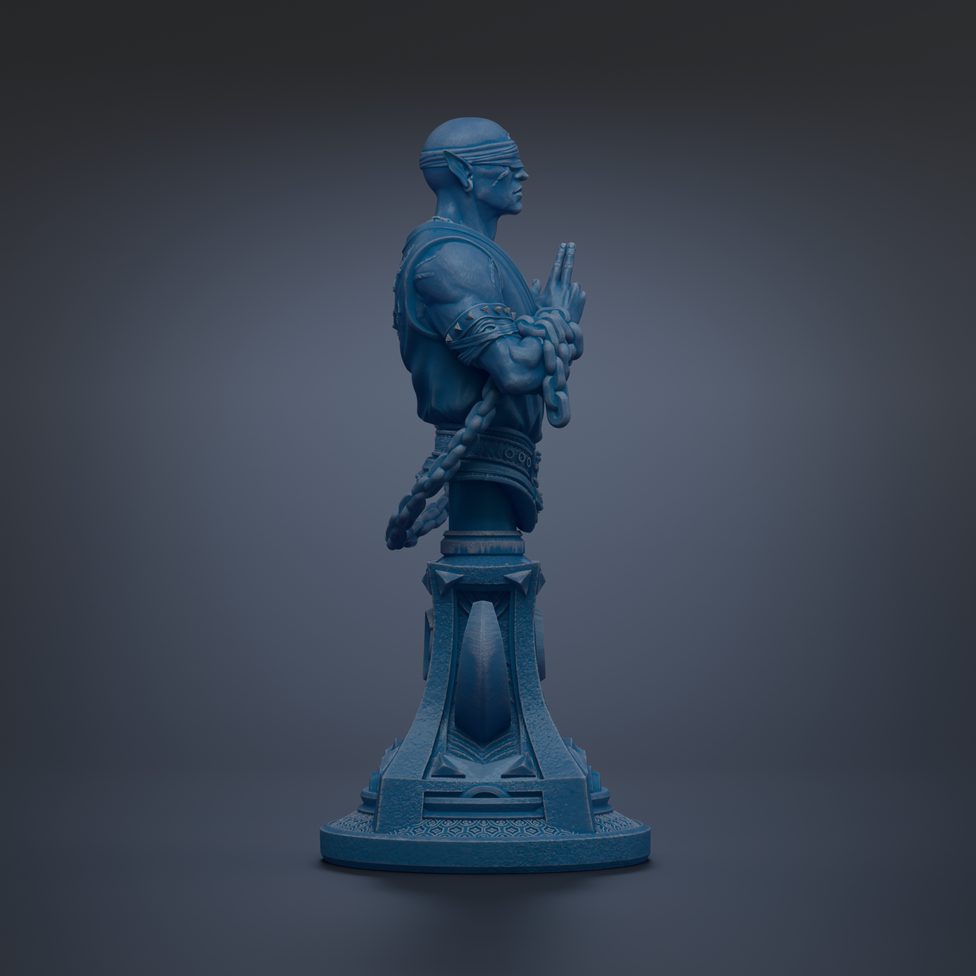A blue statue of a man with a chain around his neck, standing on a pedestal.