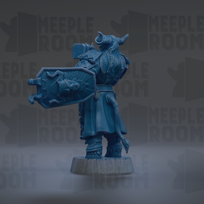 A blue figurine of a warrior standing on a pedestal, holding a shield and a sword.