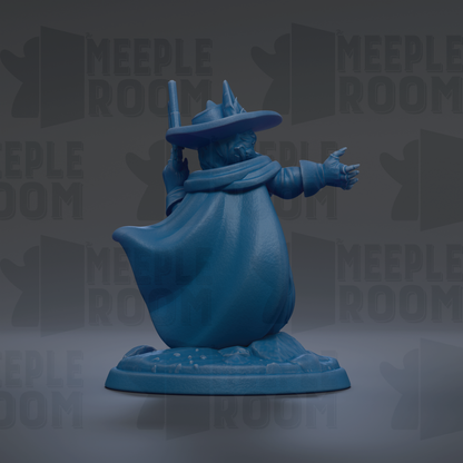 A blue figurine of a wizard or magical being, wearing a hat and holding a wand, is the central focus of the image.