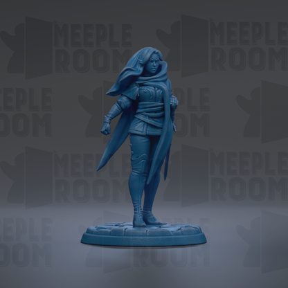 A figurine of a woman in a blue outfit, standing on a base and holding a sword.