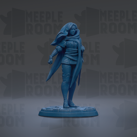 A figurine of a woman in a blue outfit, standing on a base and holding a sword.
