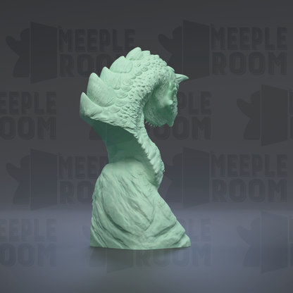 A green, sculpted statue of a dragon-like creature is displayed against a dark background with repeated text.