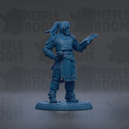 A blue figurine of a person standing on a platform, holding a book or object in their hand.