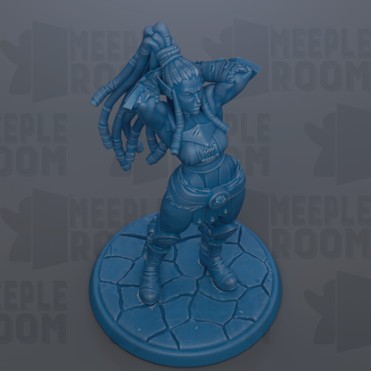 A blue figurine of a female character with long hair and a distinctive hairstyle, standing on a blue base with a stone texture.