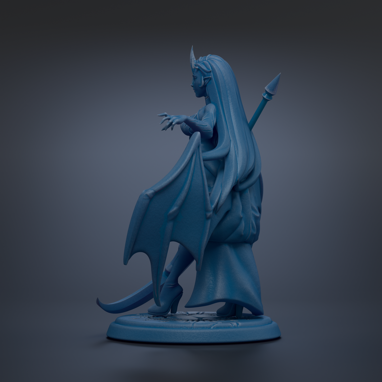 A blue statue of a winged, female figure with long hair and a pointed hat, standing on a pedestal.