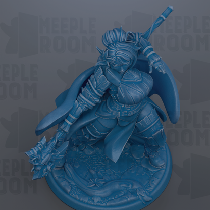 A blue figurine of a warrior figure, holding a weapon and standing on a base.