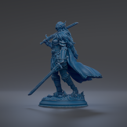 A blue statue of a warrior figure holding a sword and shield, standing on a base and facing to the right.