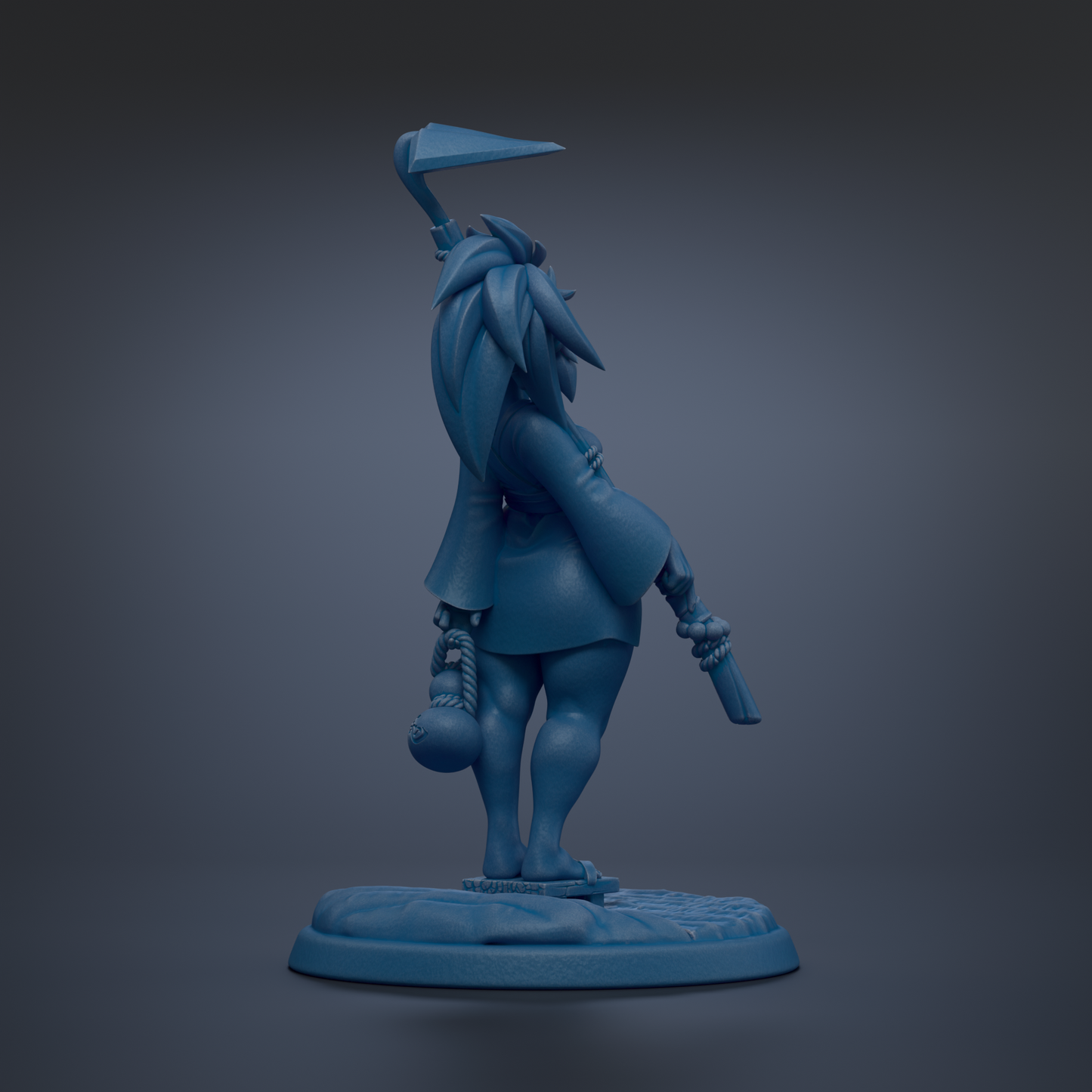 A blue figurine of a character with a pointed hat and a sword, standing on a base.