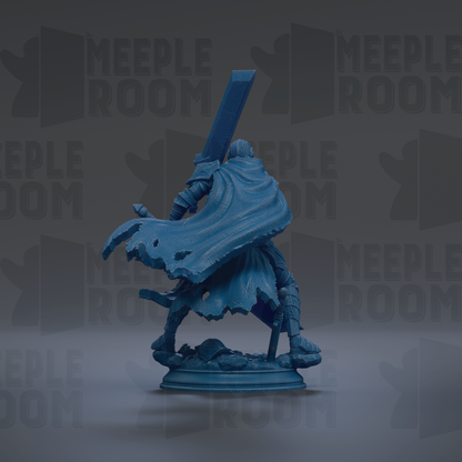A blue figurine of a warrior figure holding a sword and shield, standing on a base and facing away from the camera.