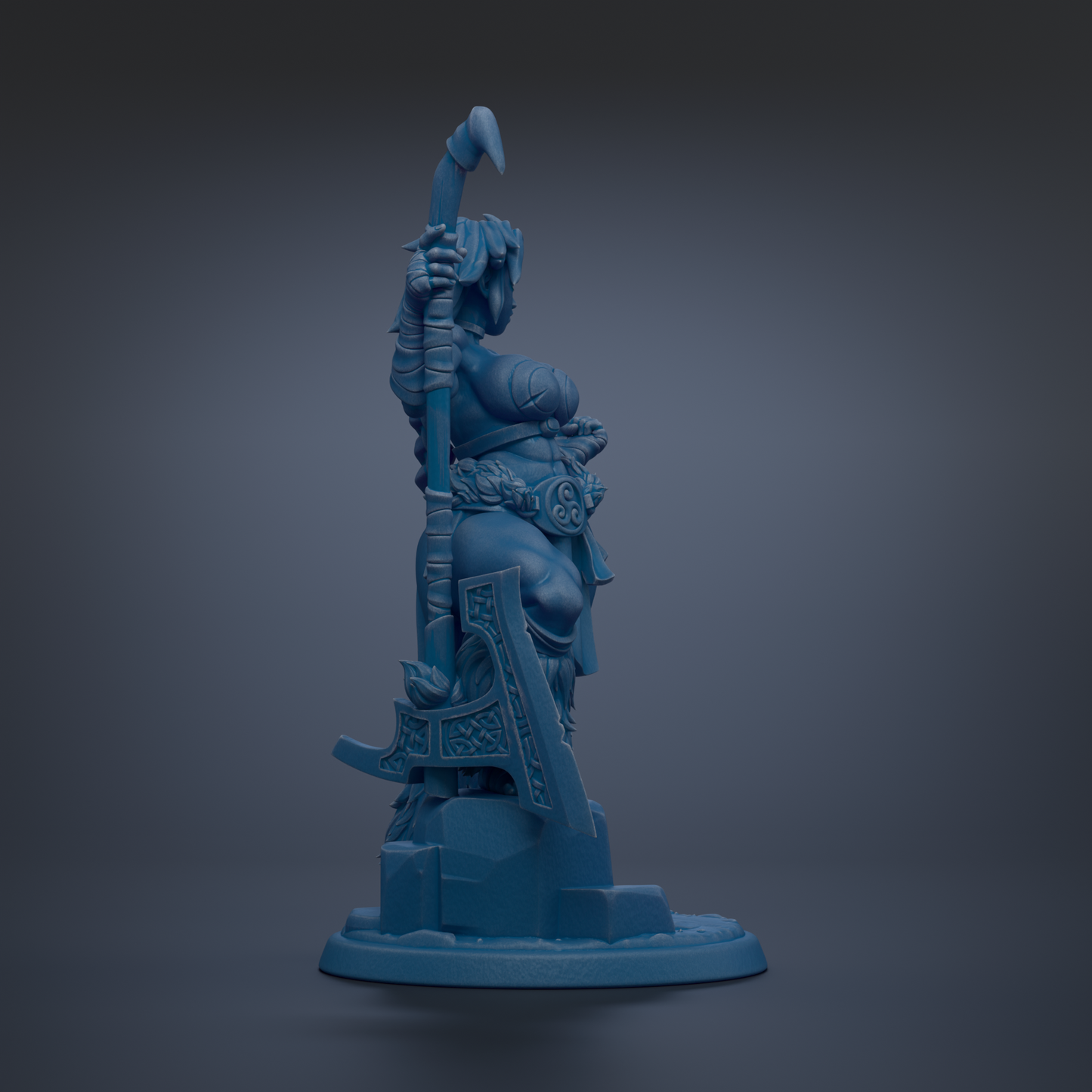 A blue figurine of a warrior standing on a pedestal, holding a weapon in one hand and a staff in the other.