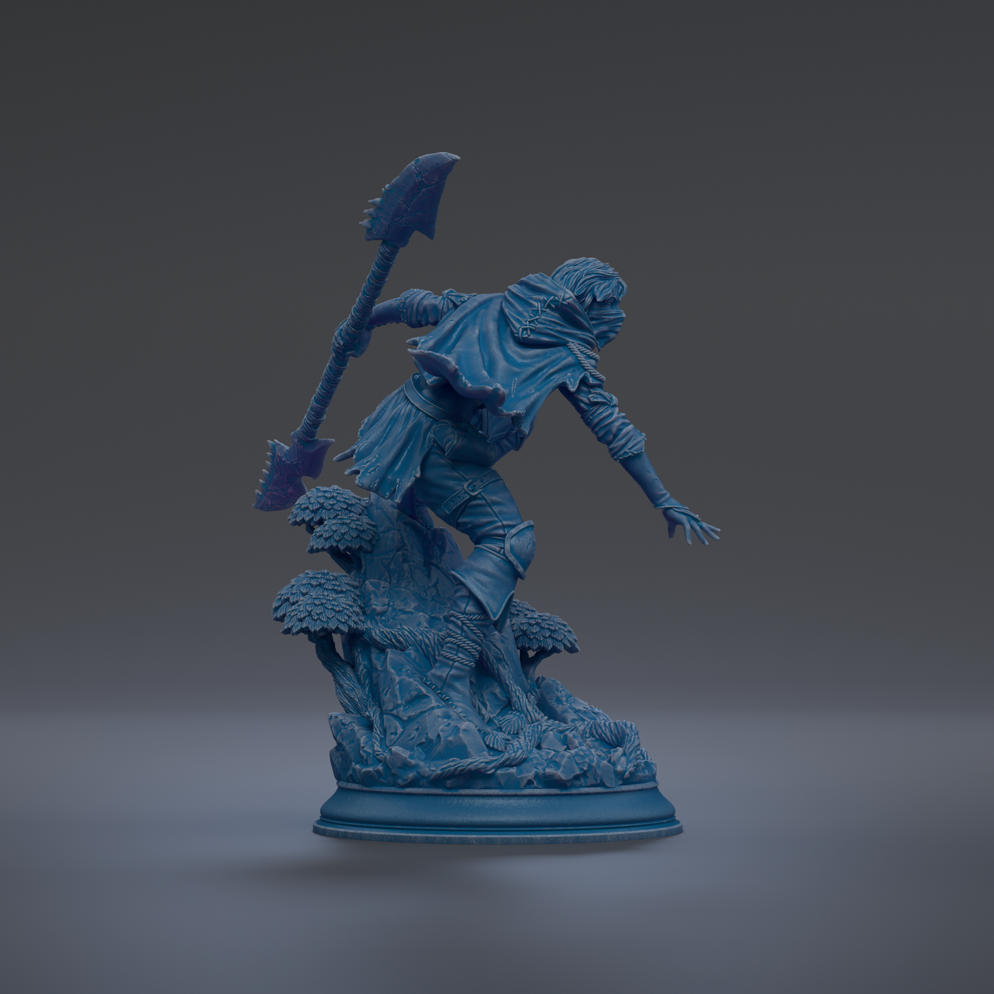 A blue statue of a warrior figure holding a spear and shield, standing on a rocky base with trees in the background.