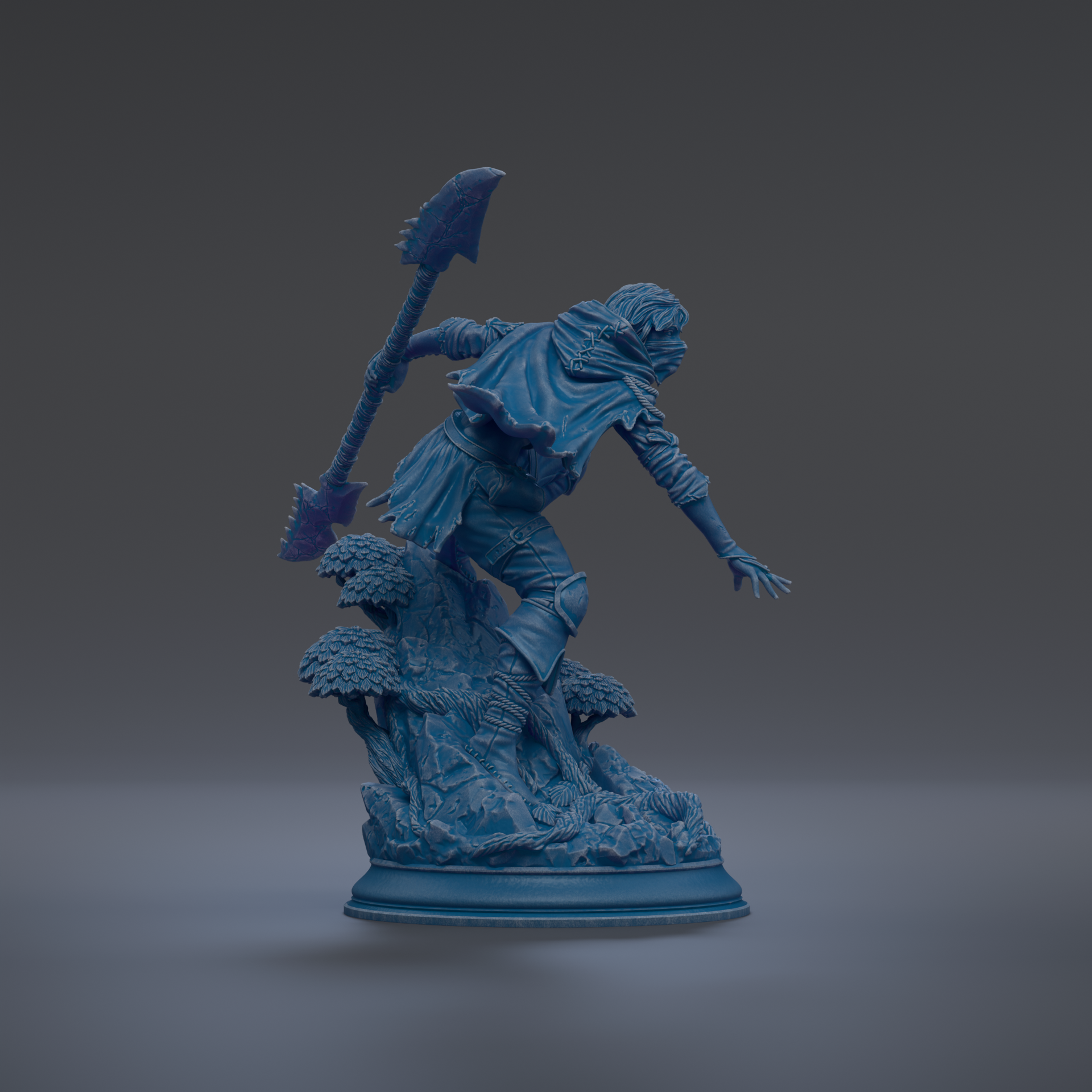 A blue statue of a warrior figure holding a spear and shield, standing on a rocky base with trees in the background.