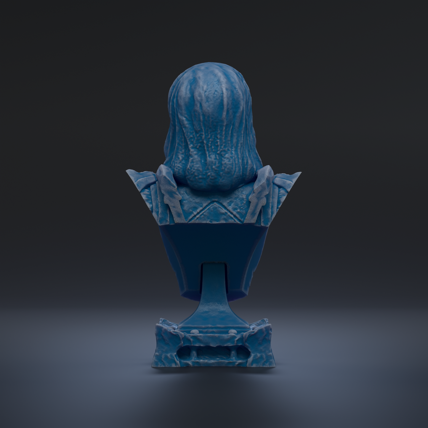 A blue bust sculpture is shown against a dark background.