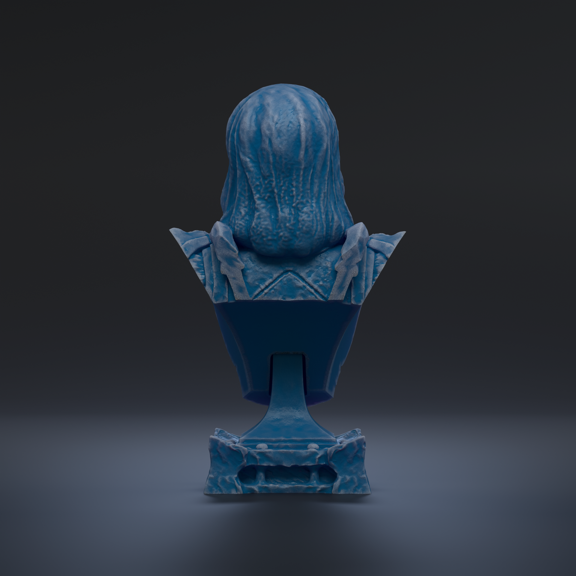 A blue bust sculpture is shown against a dark background.