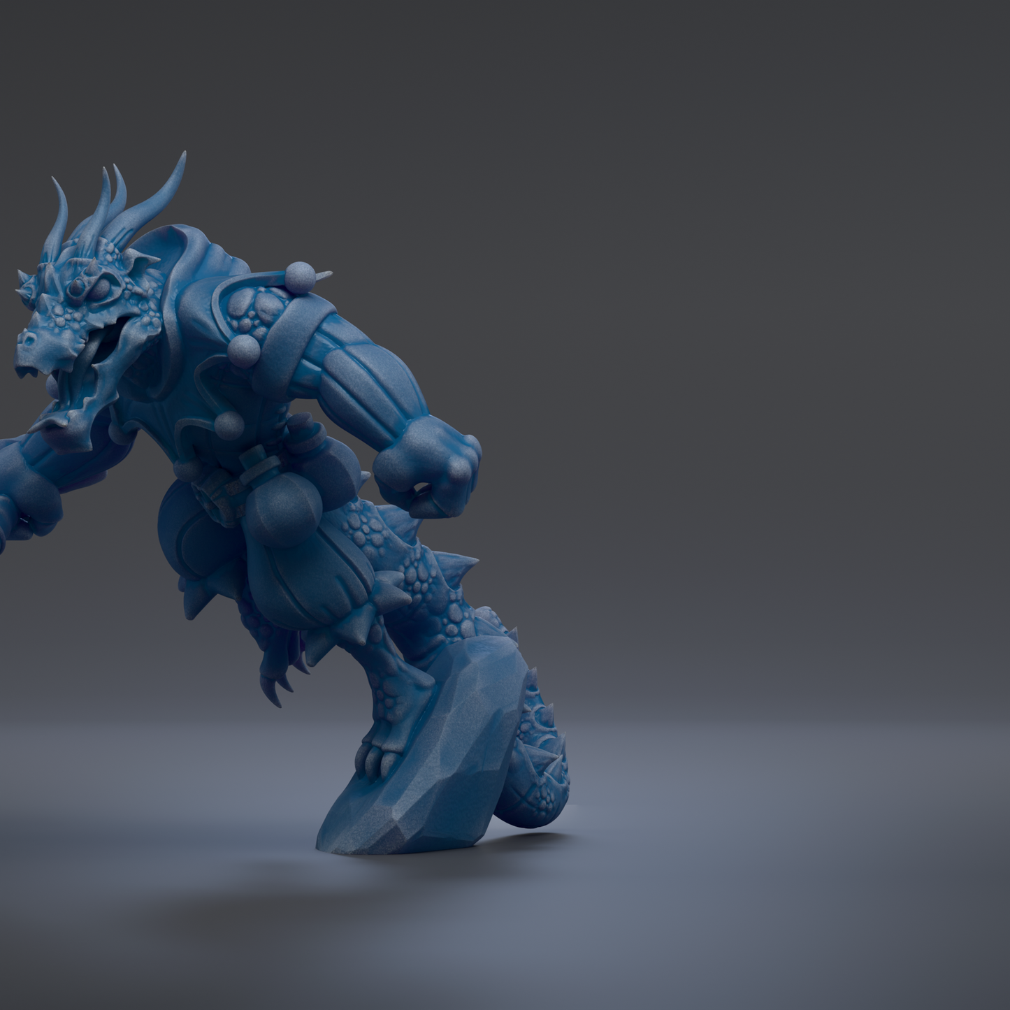 A 3D rendering of a blue dragon-like creature with sharp teeth and claws, standing on a rock and appearing to be in motion.